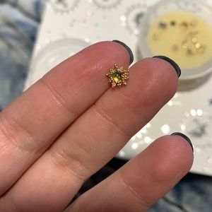 Alchemy Adornment “Wren” with Peridot center and Oregon sunstone surrounding